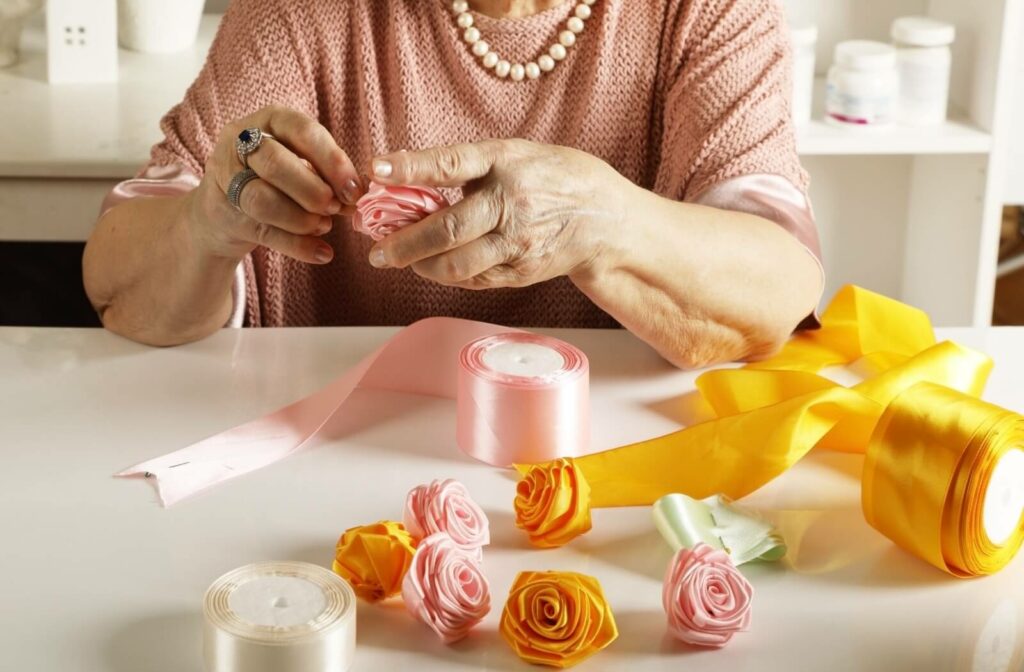 a senior doing a paper craft